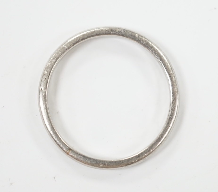 A white metal (stamped platinum) wedding band, size M/N, 3.2 grams.